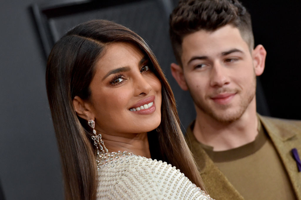 Close-up of Priyanka and Nick smiling at a red carpet event