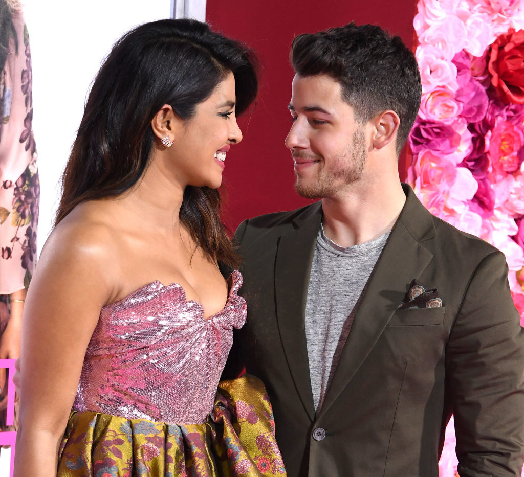 Priyanka and Nick smiling at each other