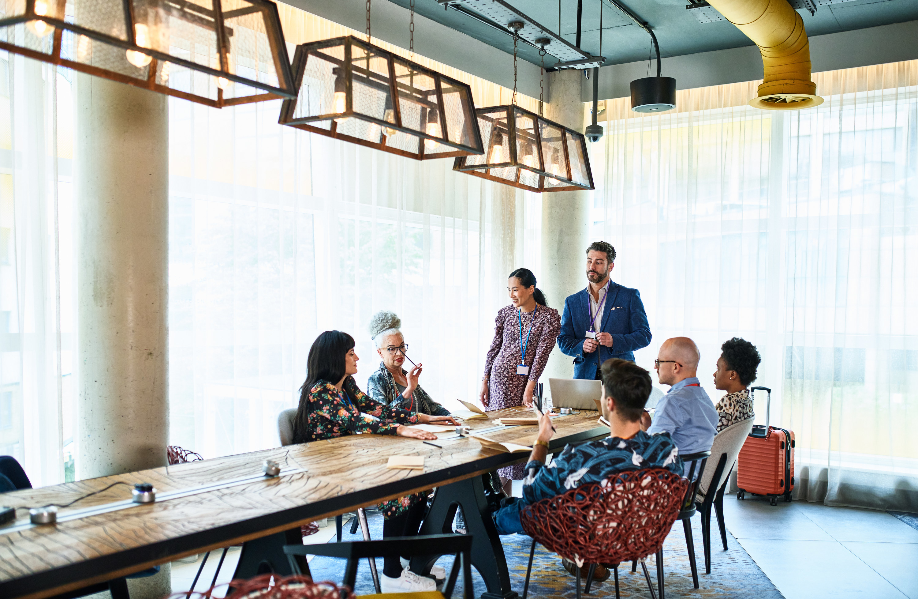 a group of people at a table together