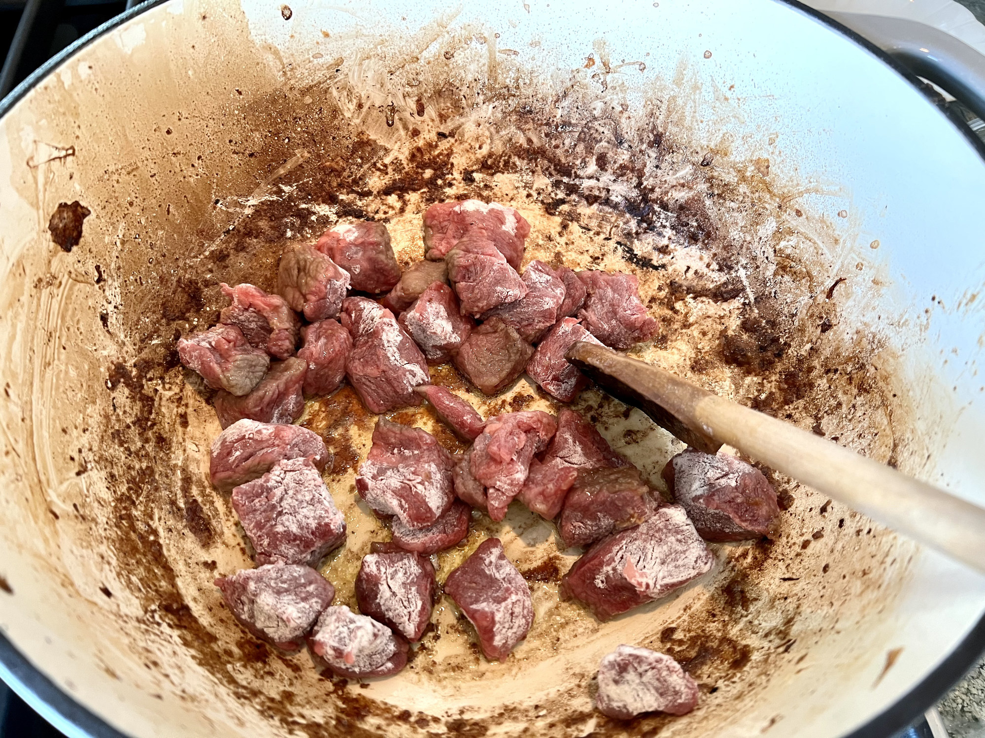 Browning chunks of meat in a Dutch oven