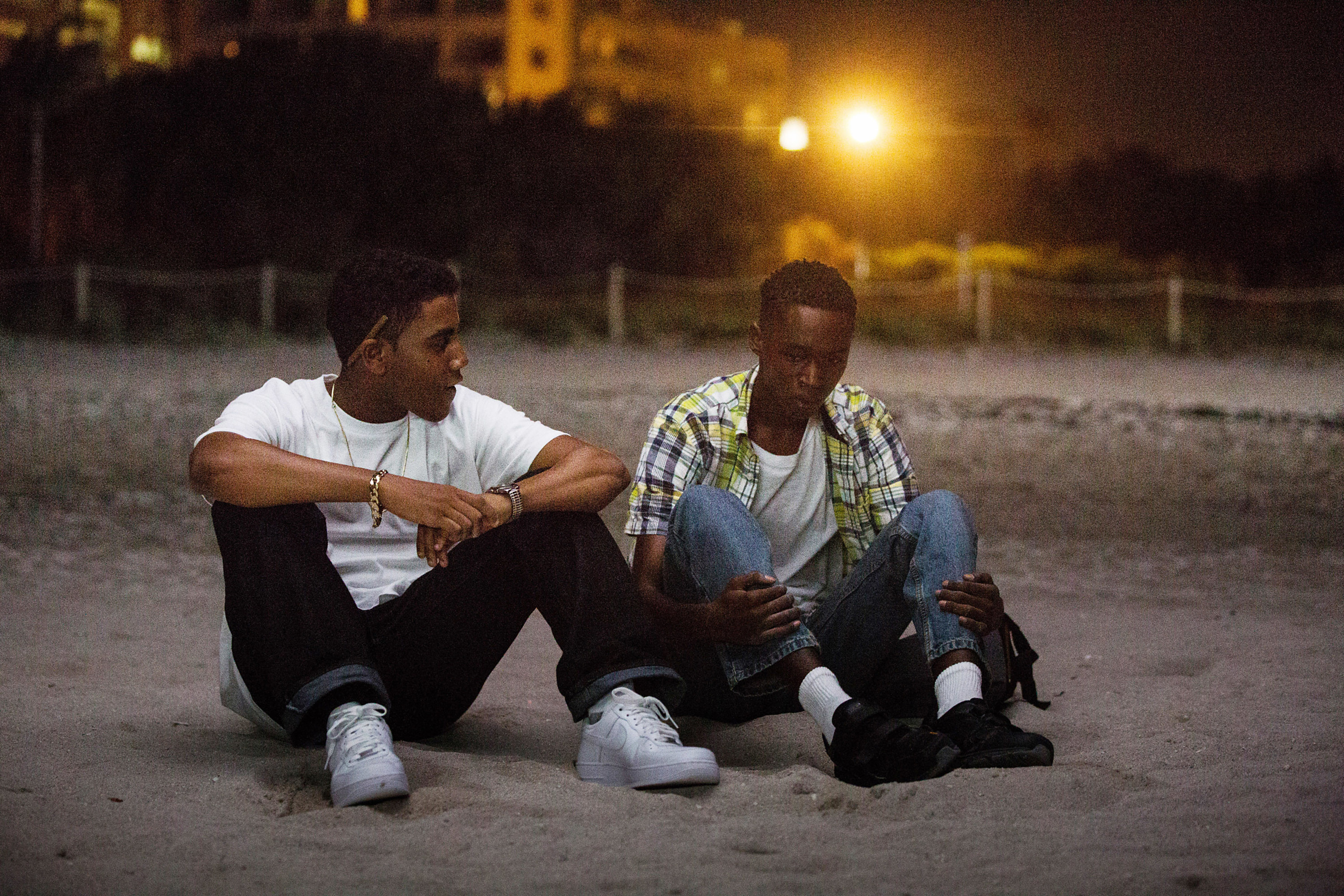 Chiron and Kevin from &quot;Moonlight&quot; sitting on the beach