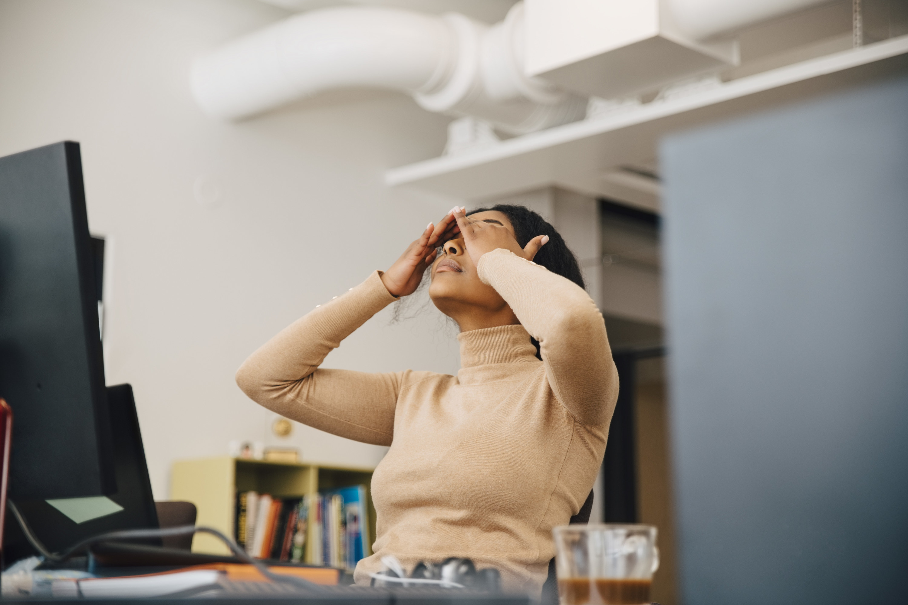 stressed out woman working in an office