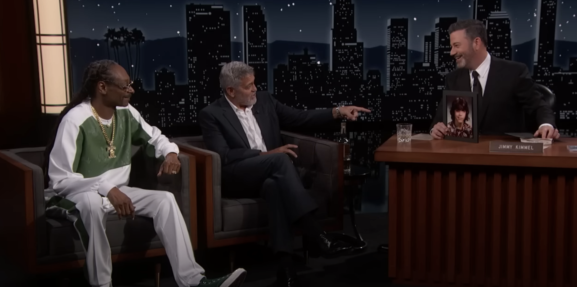 snoop and clooney sitting as guests with jimmy behind the desk