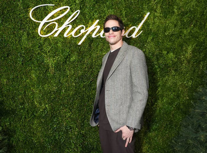 pete wearing a blazer and sunglasses at an event