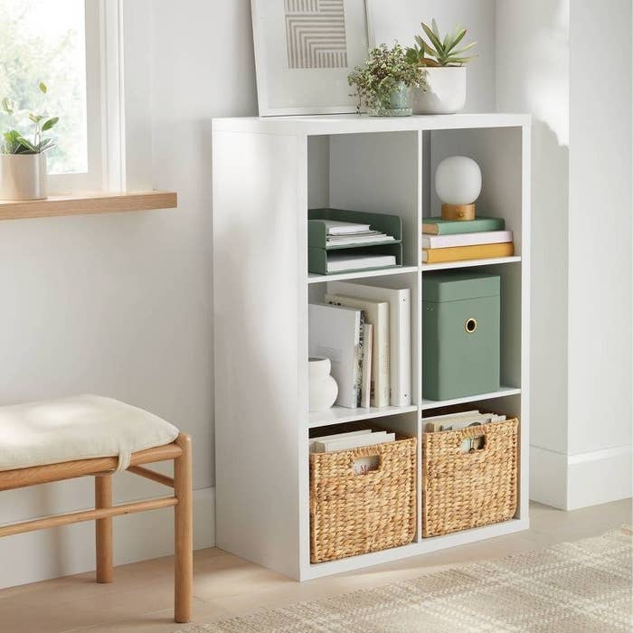 the white organizer with six open shelves