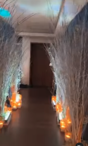 A lit-up entryway for the baby shower