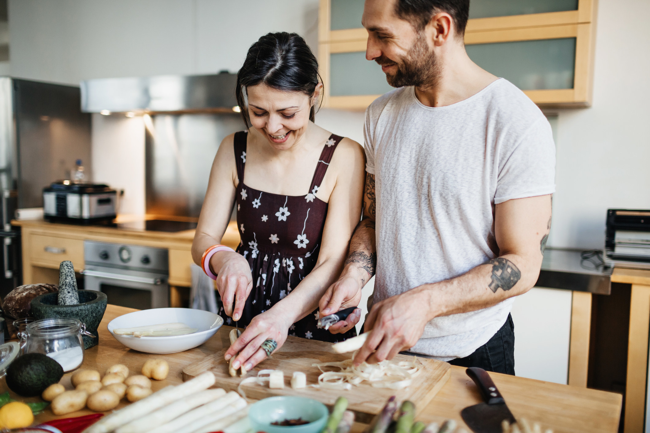 A couple cooking together