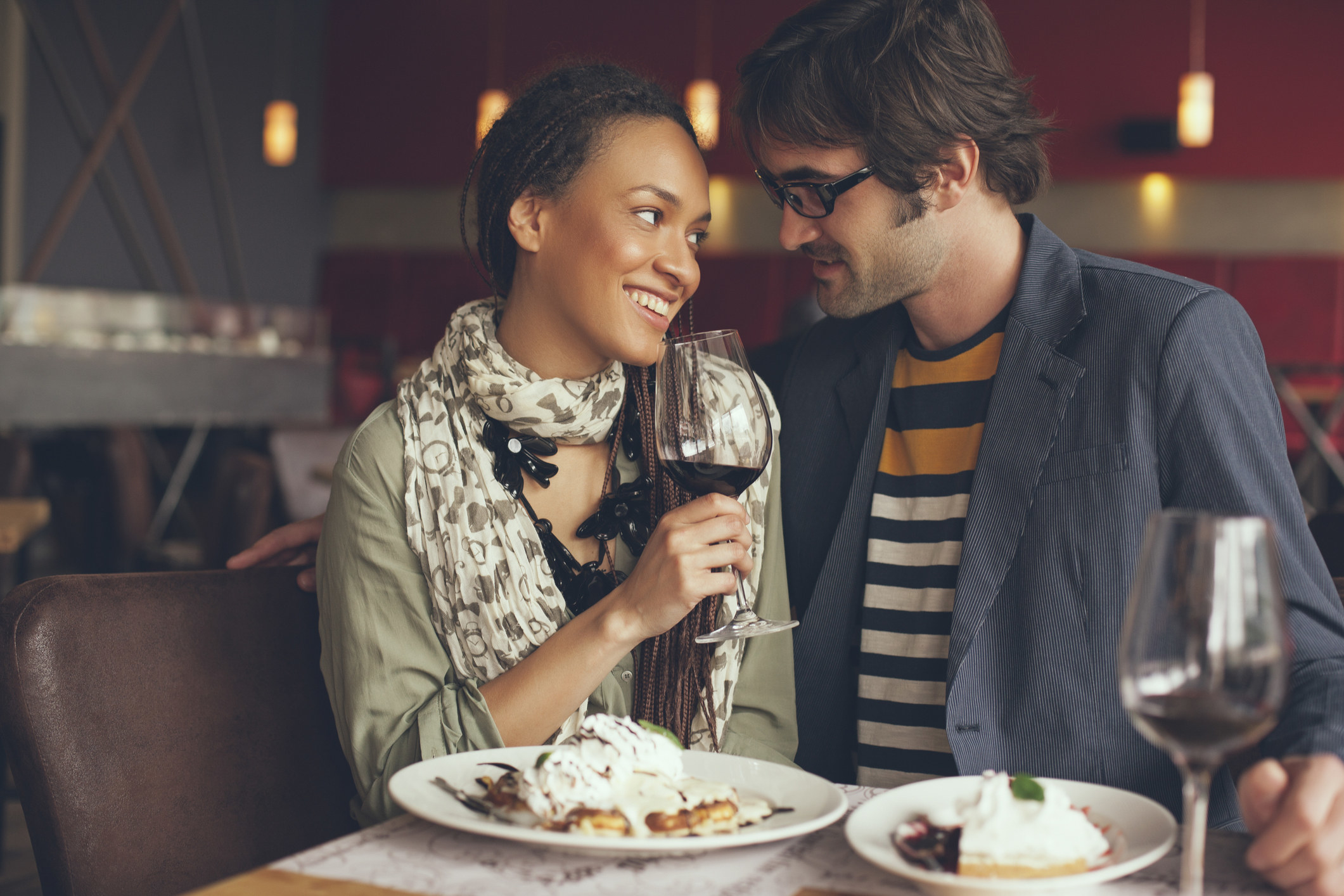 A couple looking at each other and smiling