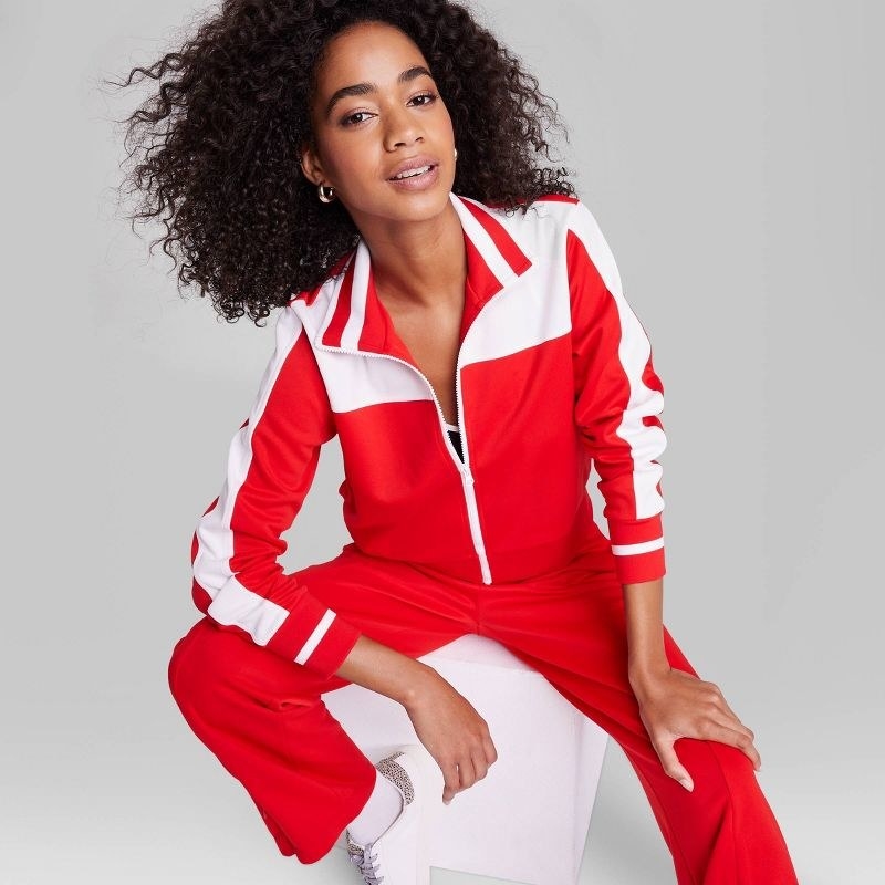 Model wearing the red jacket