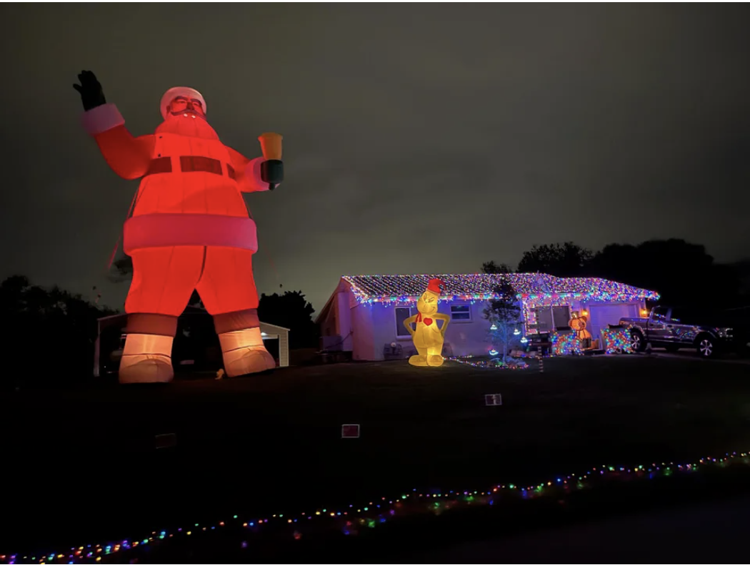 A giant Santa near a house