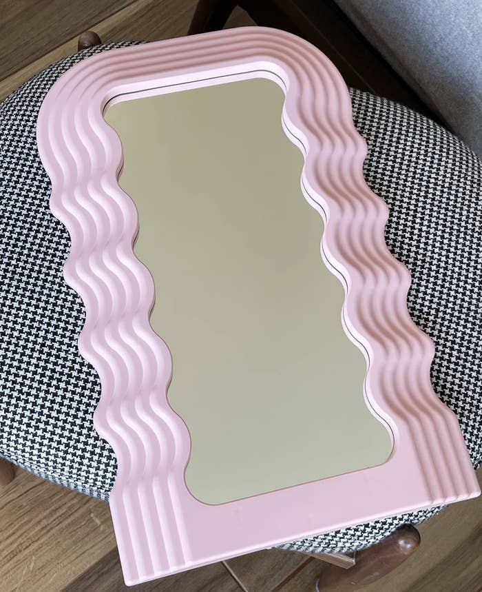 The mirror on a houndstooth tablecloth
