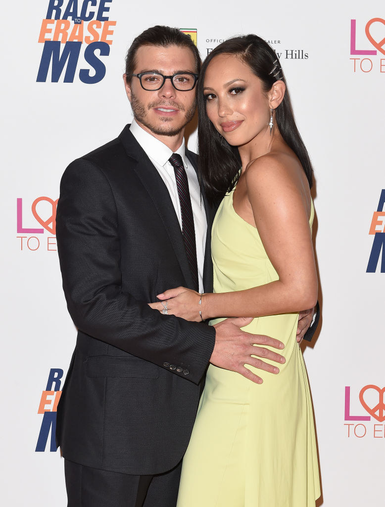 The former couple posing for a photo at a red carpet event