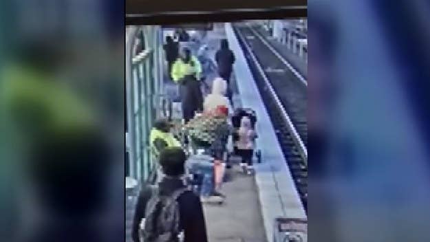 A woman faces a slew of charges after she allegedly pushed a 3-year-old child off a train platform and onto the tracks in an "unprovoked" attack.