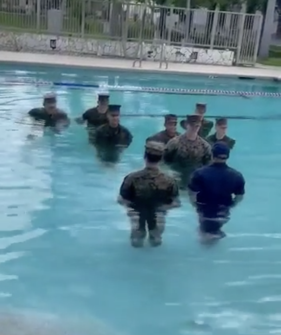 Soldiers in a swimming pool