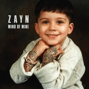 cover for &quot;Mind of Mine&quot; which is a photo of young zayn with tattoos photoshopped onto his arms