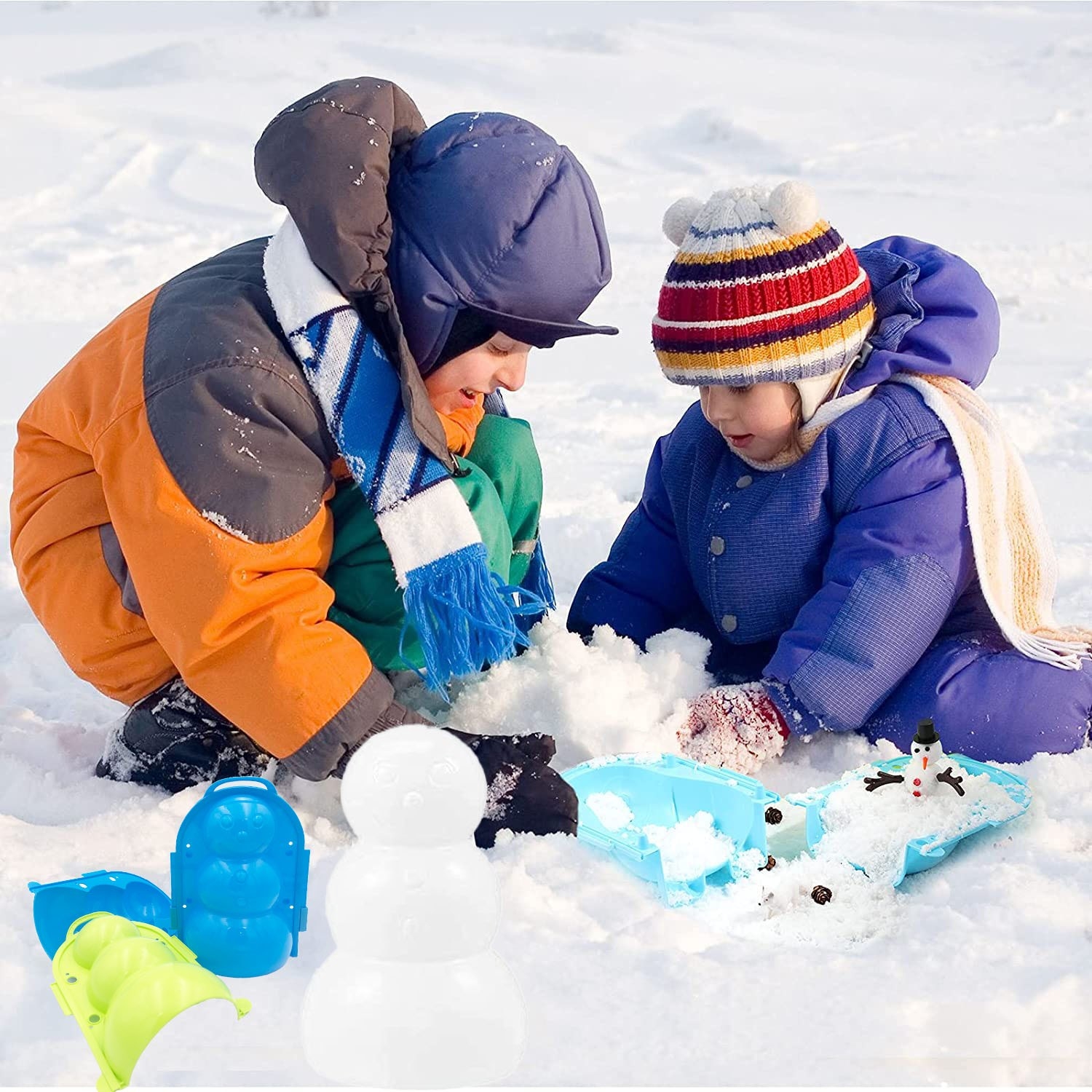 Kids playing in snow with snowman mold