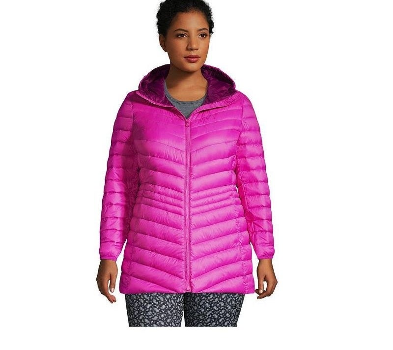 Model wearing pink packable down jacket