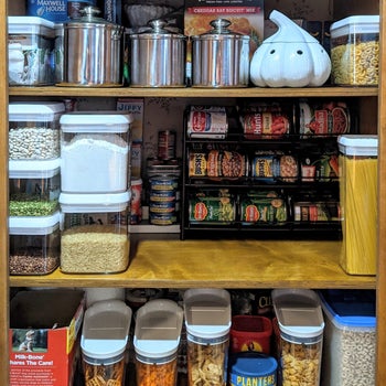 Reviewer's organized cabinet after using can dispensing rack