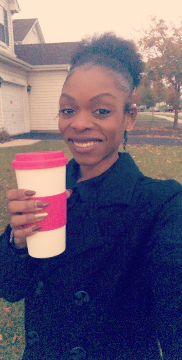 A woman holding a coffee cup