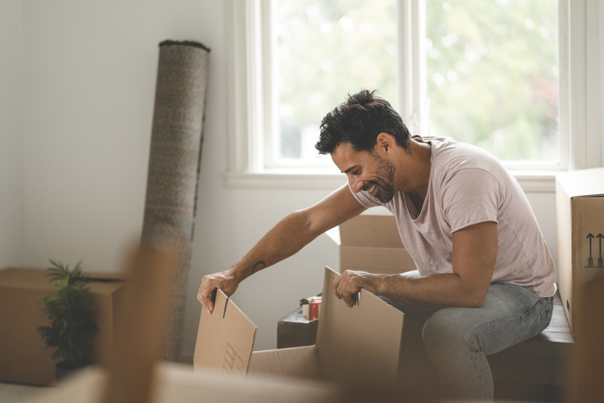 A man looking in a box