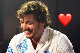 pedro pascal laughing with a heart next to him