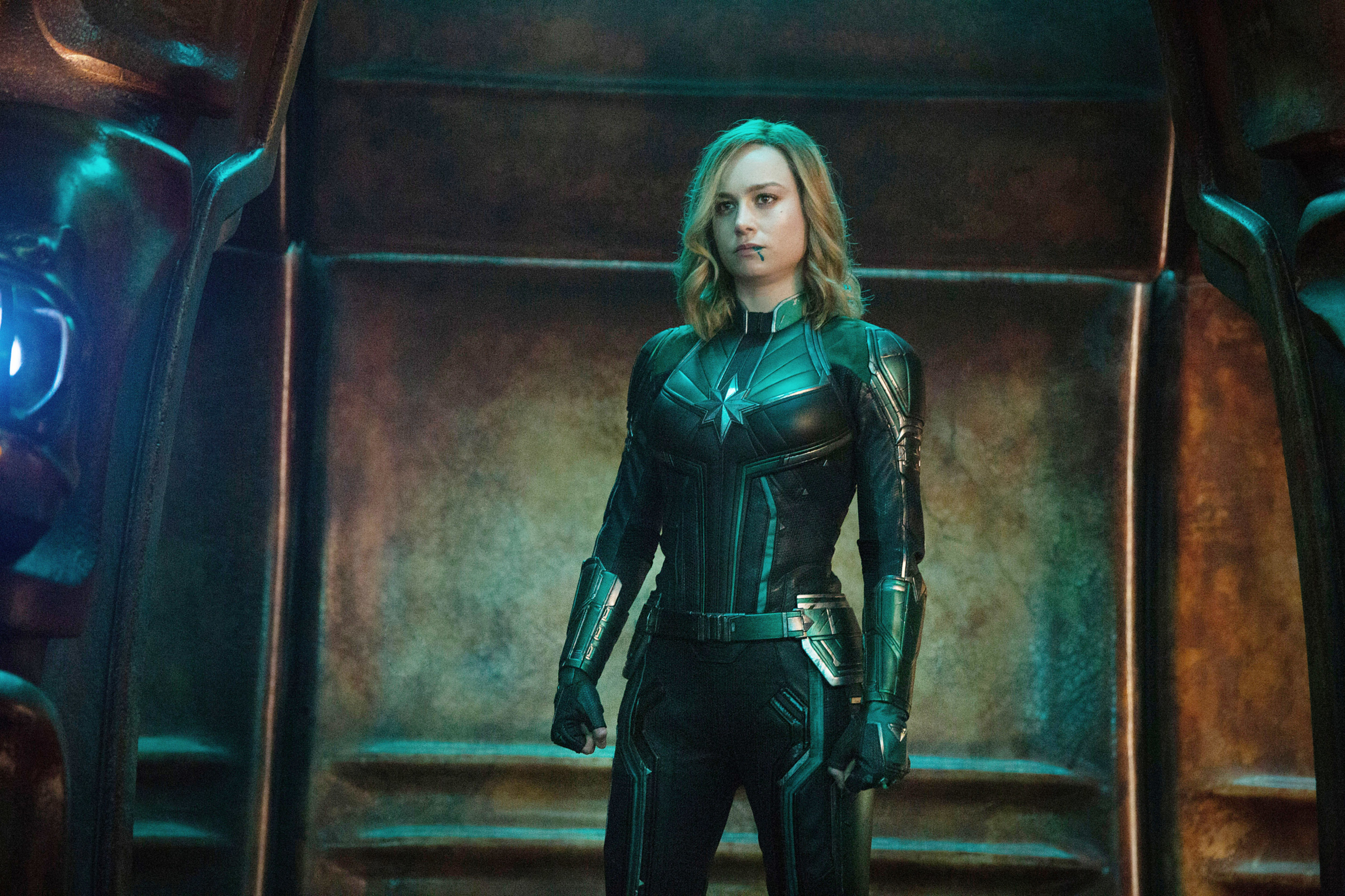 Captain Marvel suits up while looking ready to fight