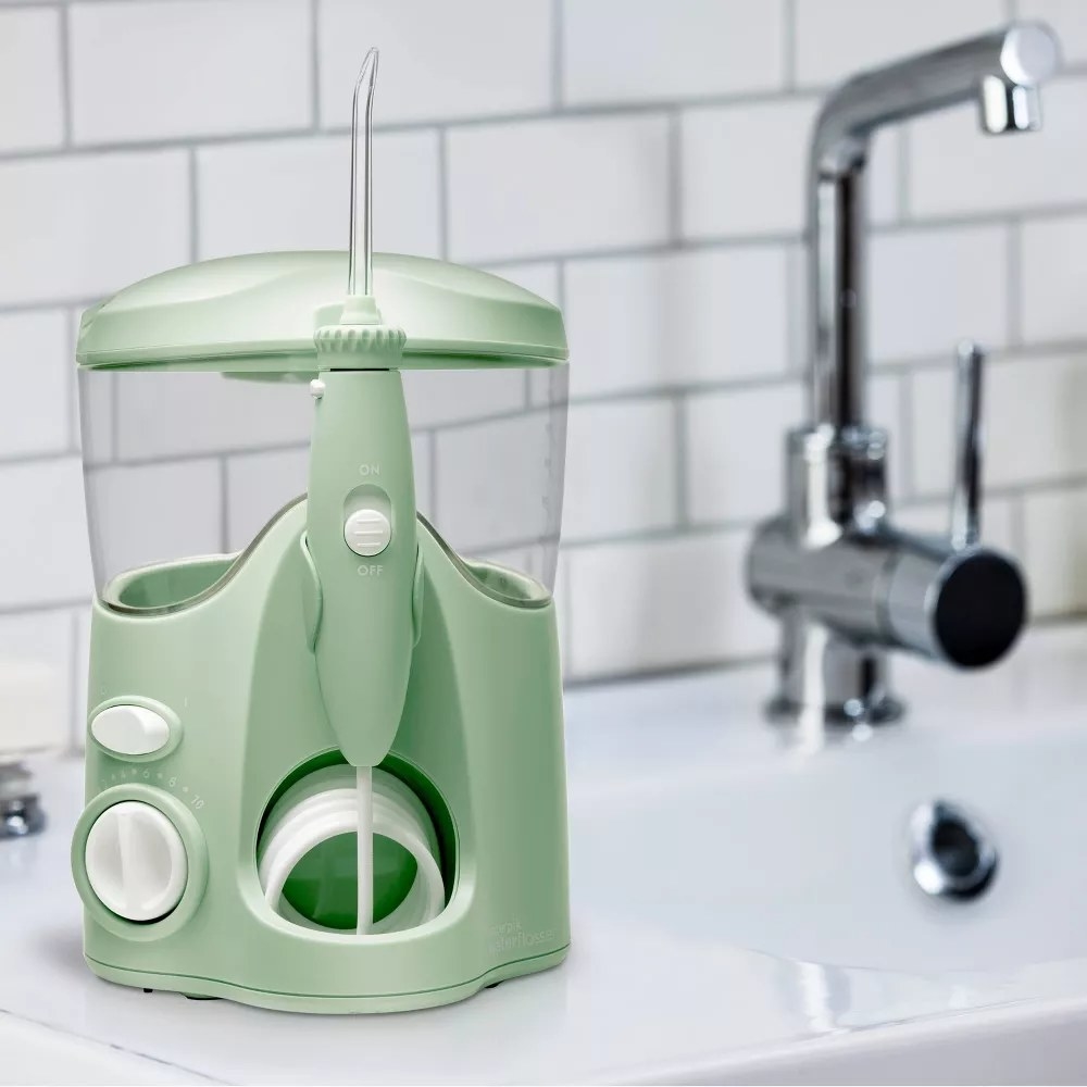 The Waterpik flosser in the color Mint Green