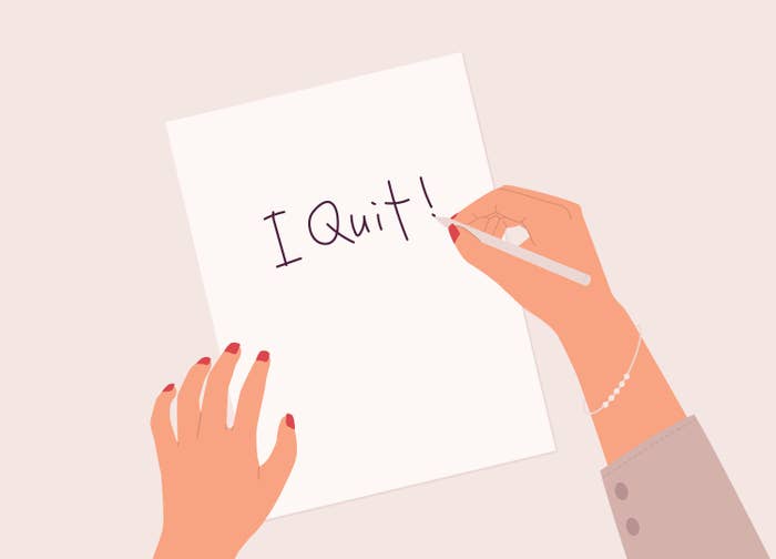 Graphic of someone writing I Quit on paper
