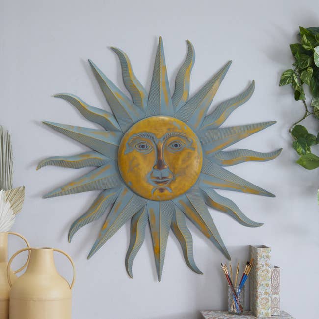 The metal sun on a wall