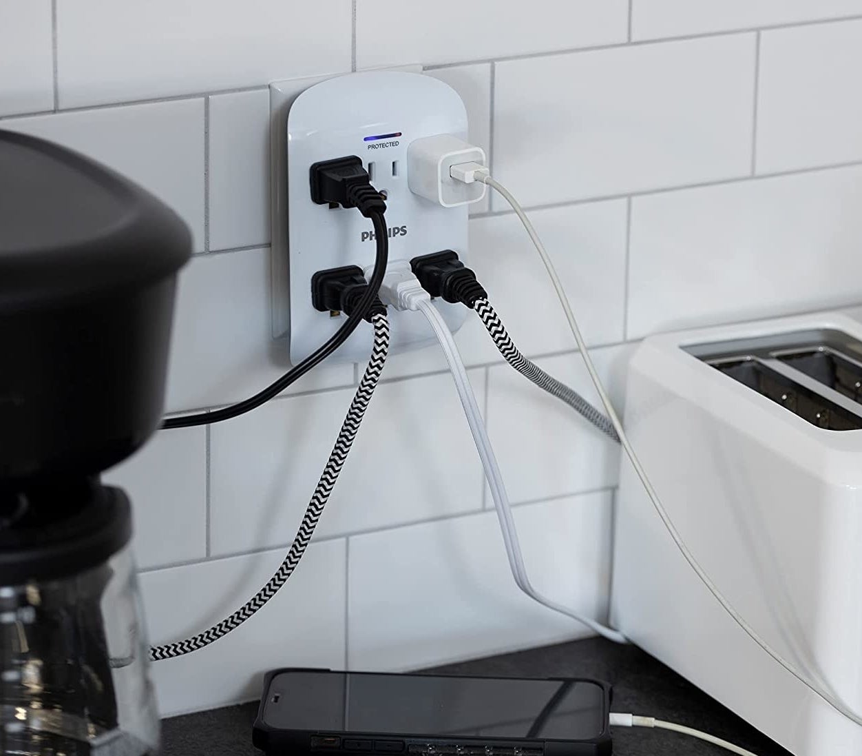 an outlet extender with six AC plugs