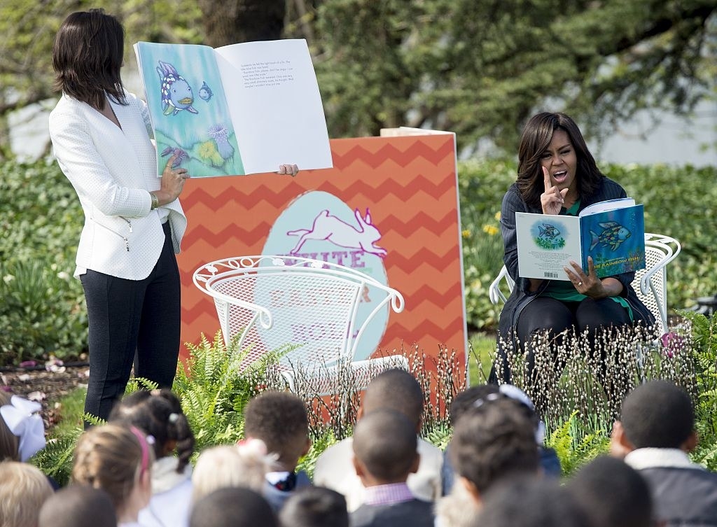 Michelle Obama reading Rainbow Fish to a group of children