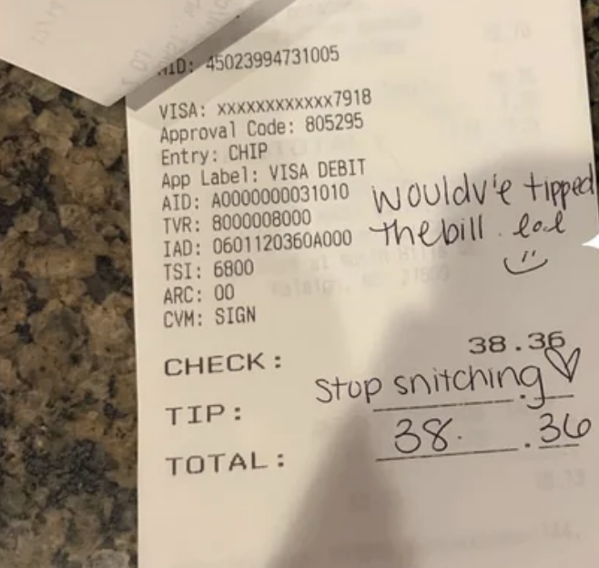 A receipt with a tip that says &quot;stop snitching&quot;