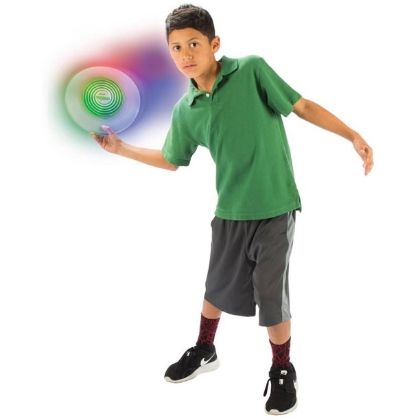 Boy playing with frisbee