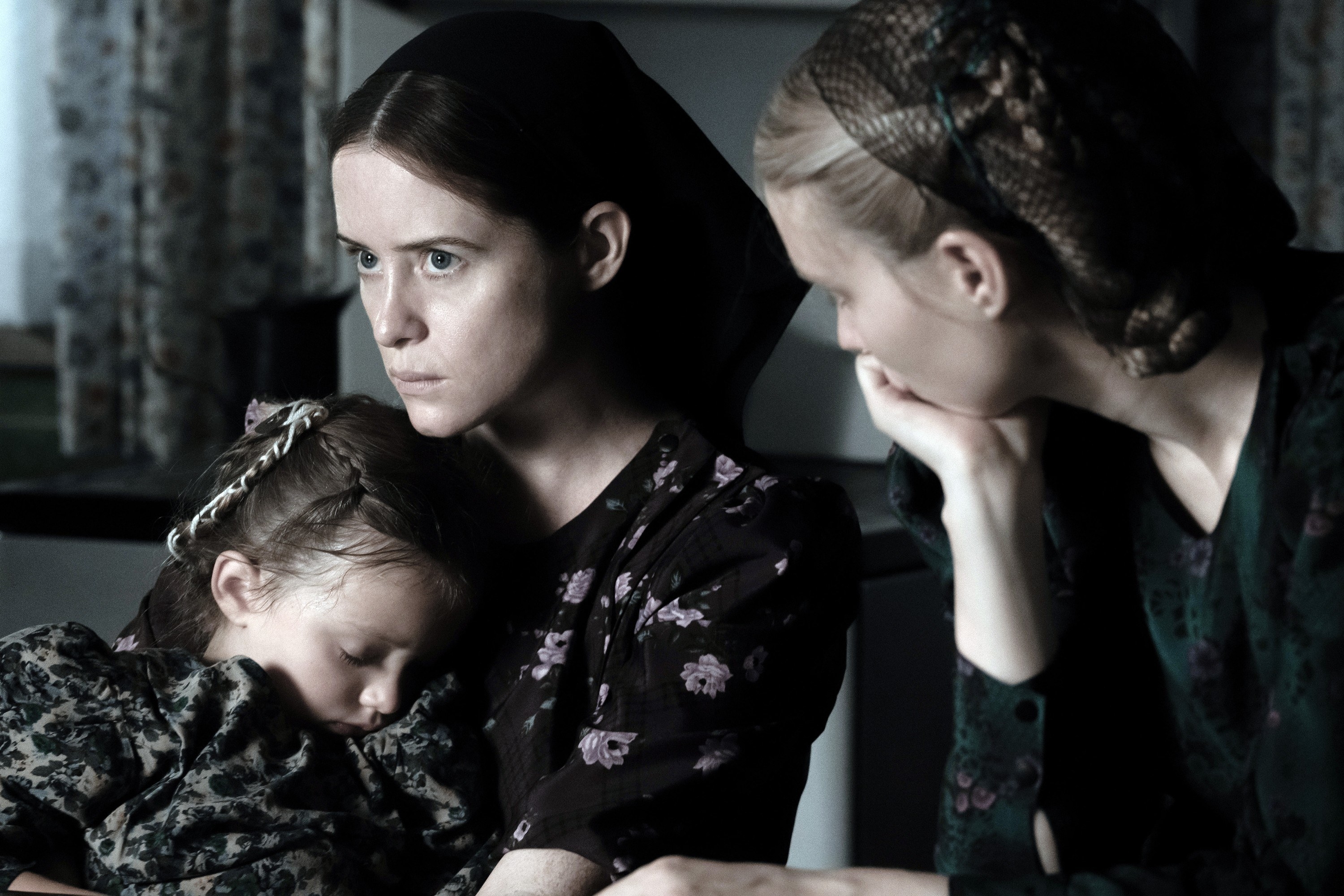 Claire Foy and Rooney Mara sit together