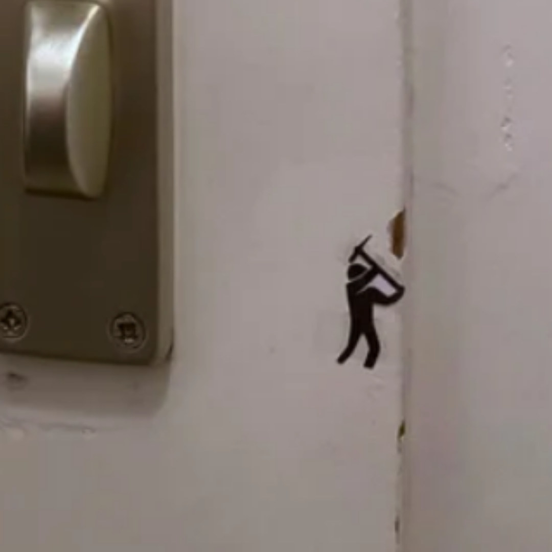 Cartoon worker on a door