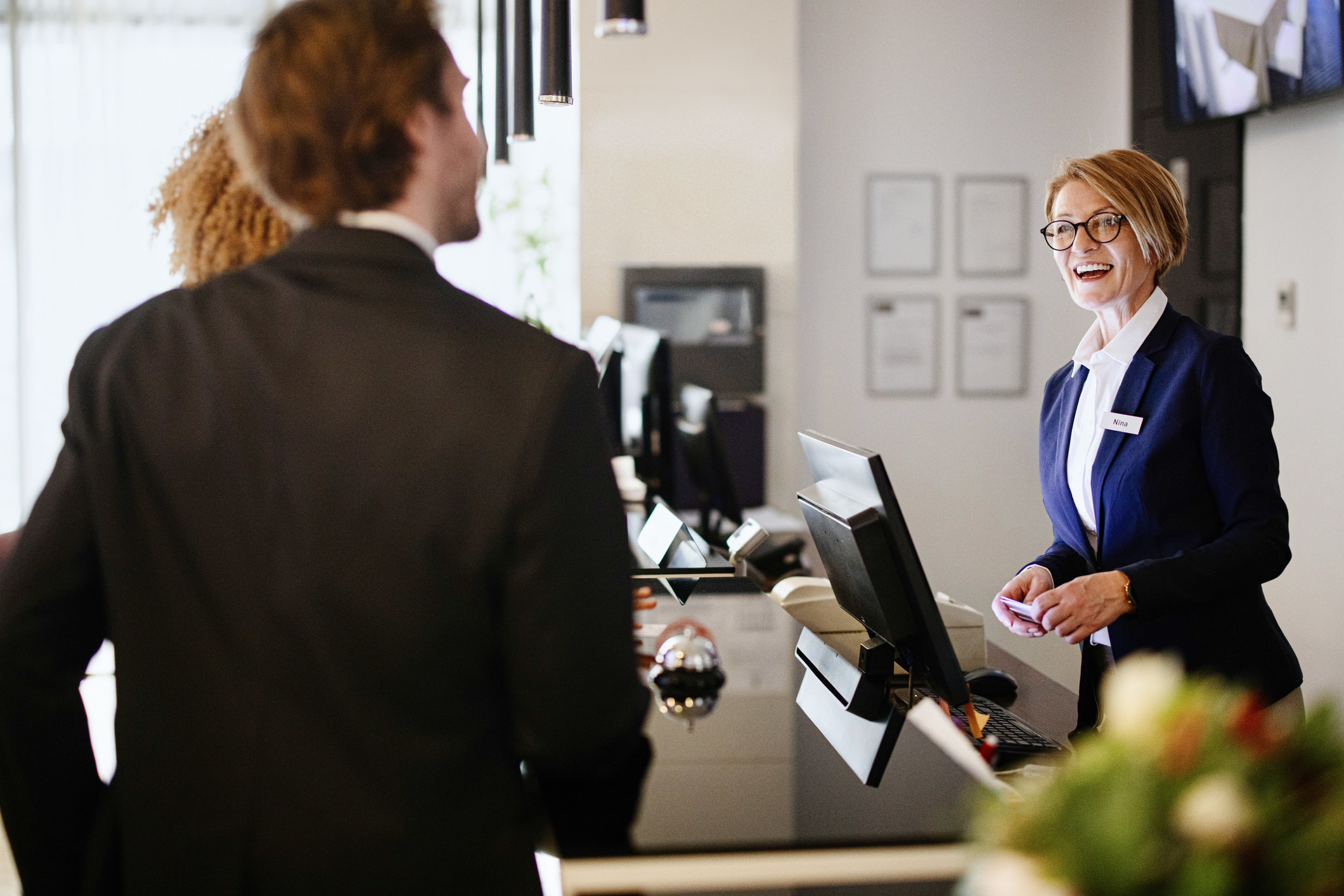 People in an office smiling