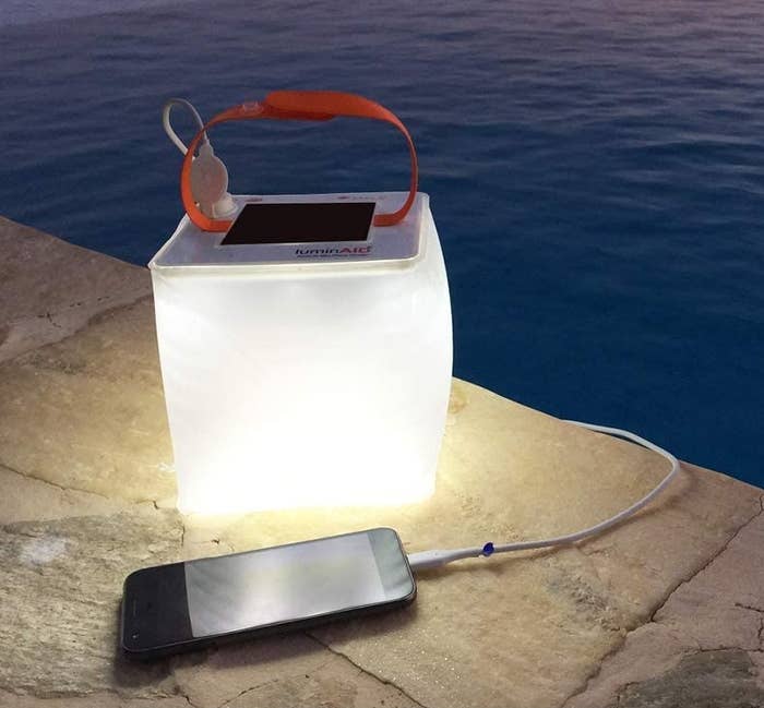 the lantern charging up a phone