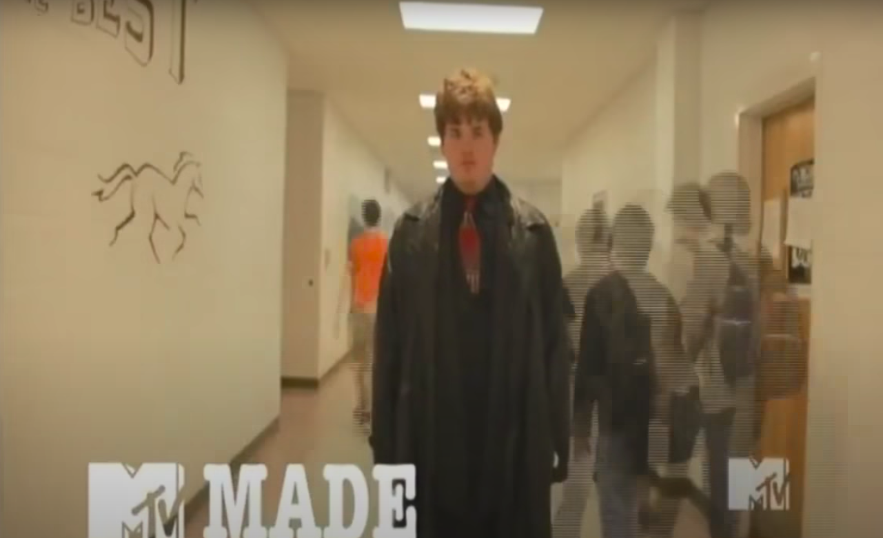 person walking down the hallway during an episode