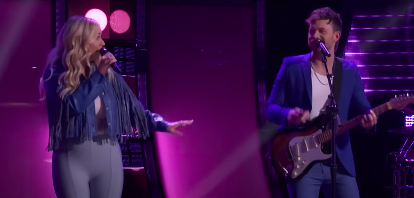 a duo singing on stage
