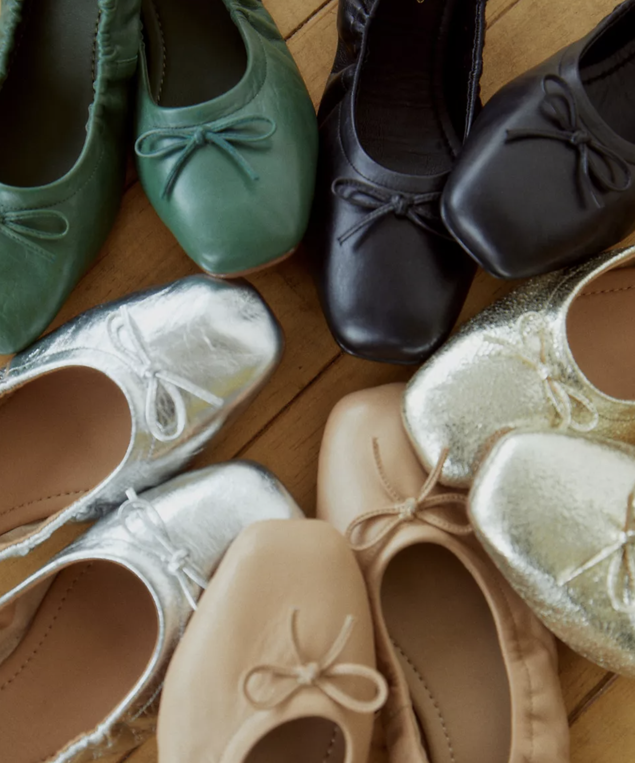 Several pairs of ballet flats arranged in a circle
