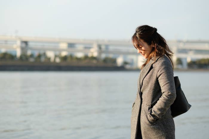 a woman walking outside