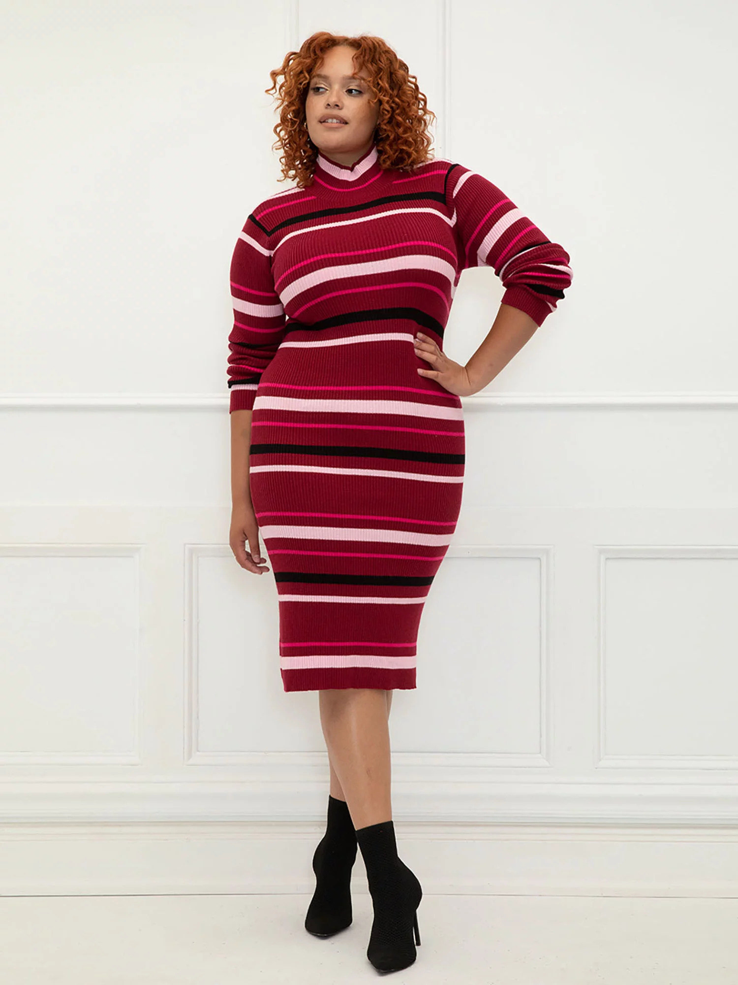 Model wearing the striped burgundy dress
