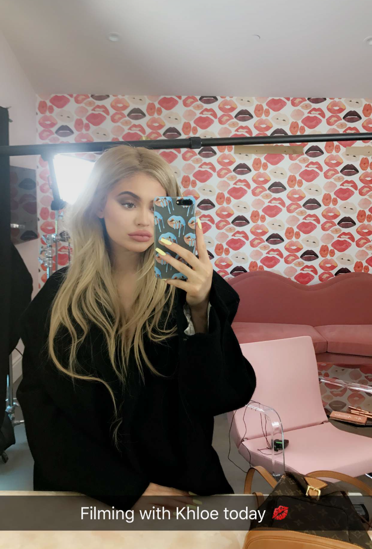 Kylie Jenner taking a mirror selfie
