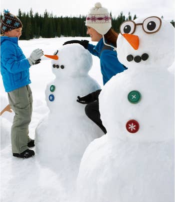 Models decorating the snow people