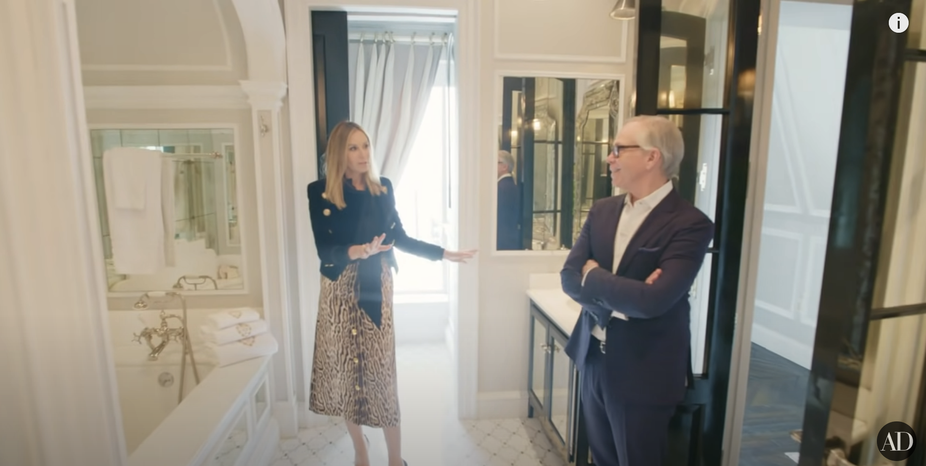 Tommy Hilfiger and his wife in their bathroom
