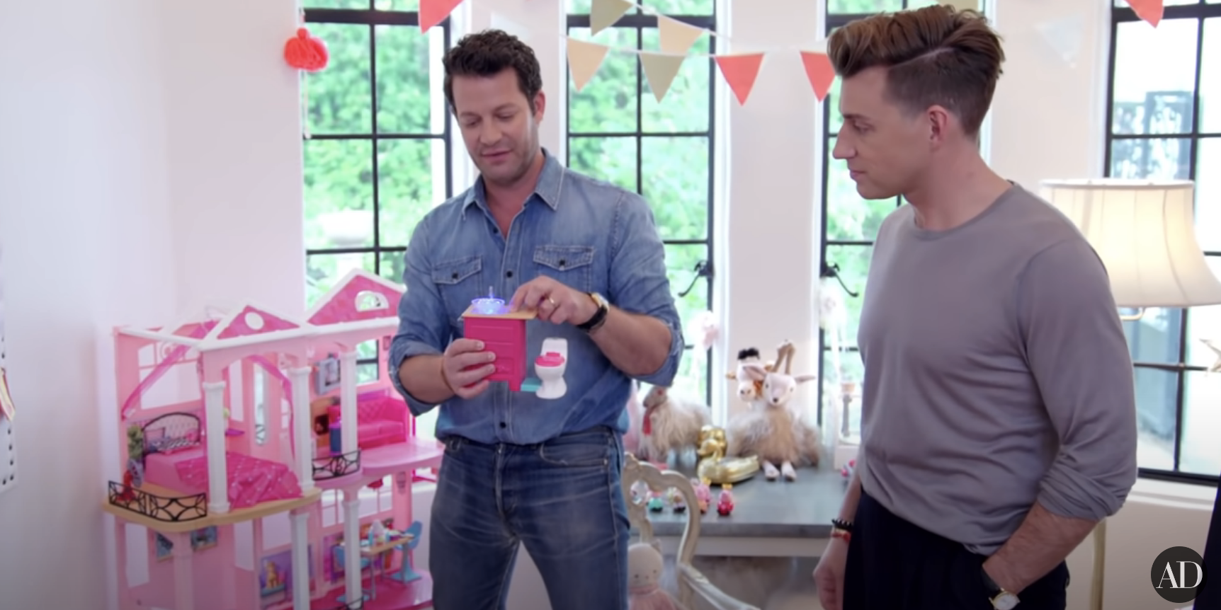 Nate Berkus and Jeremiah Brent with their daughter&#x27;s dollhouse bathroom