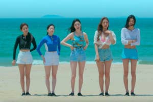 The girls of Single's Inferno line up on the beach
