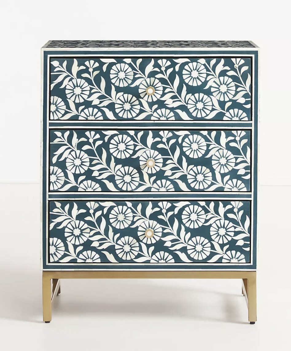 the teal nightstand with white bone inlay pattern and gold base