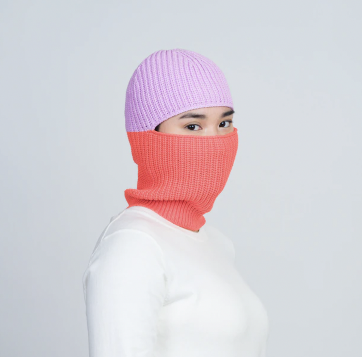 A person wearing the balaclava with a long-sleeve shirt