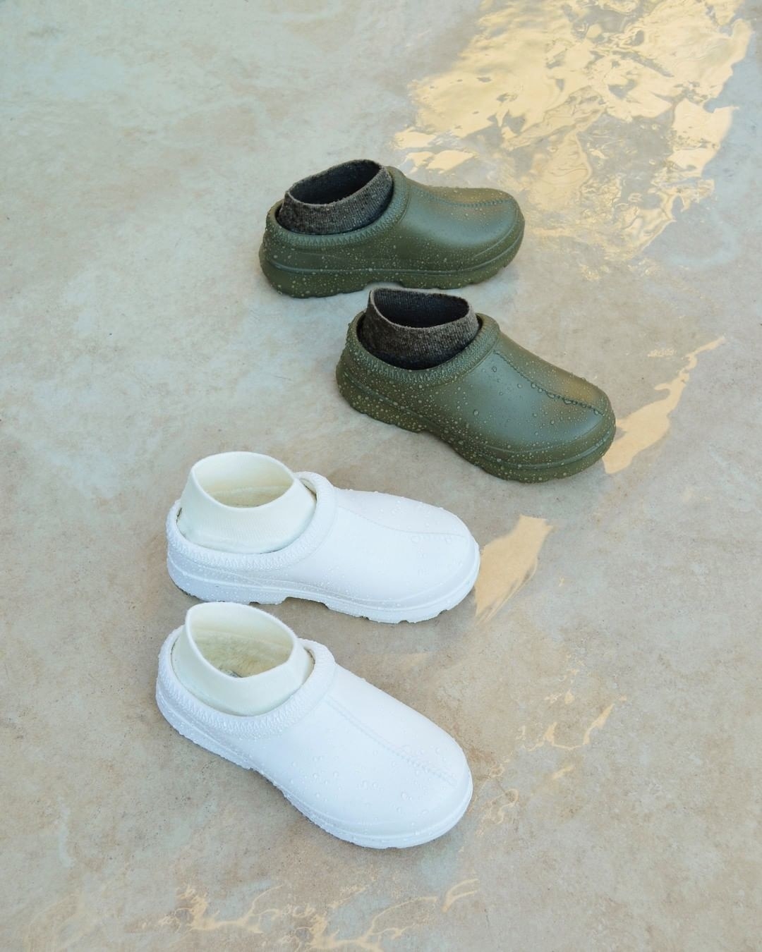 two pairs of tasman clogs in different colours